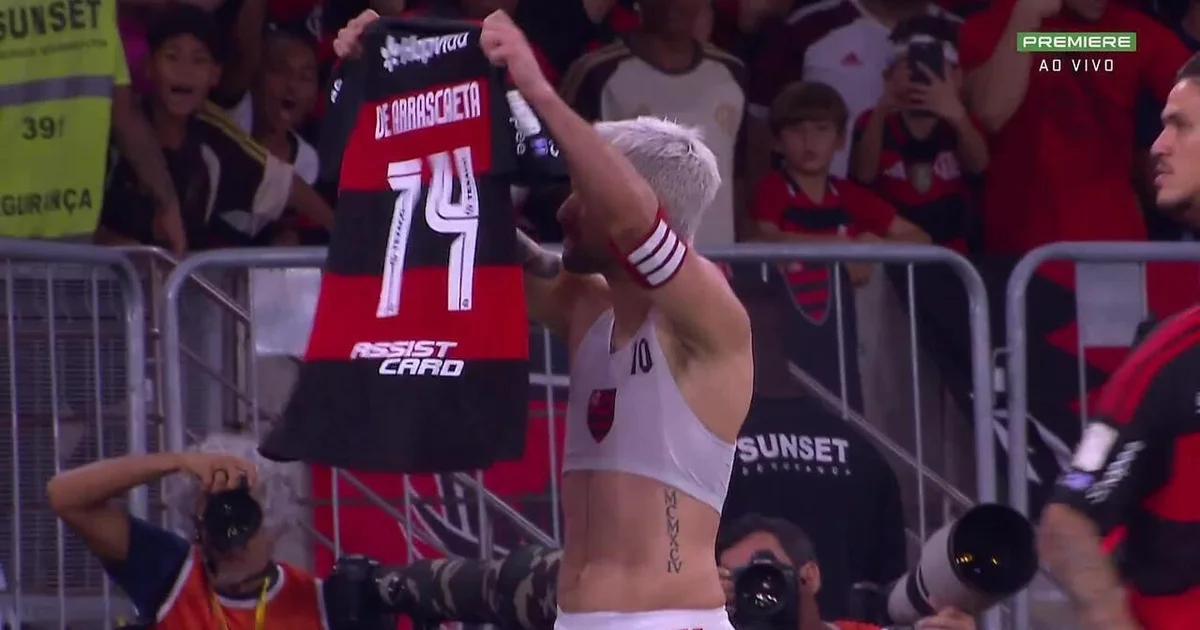 Ilustração editorial no Maracanã: time em vermelho-preto comemora gol sobre equipe em azul-branco, placar 2 a 0, torcida vibrando.